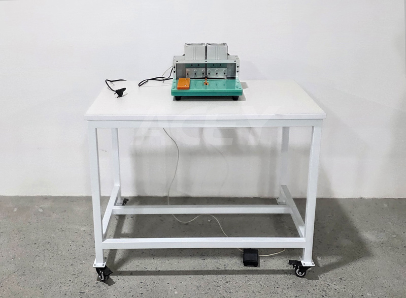 Tab cutting machine